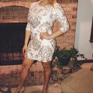 Gold and white three quarter length dress